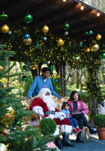 family children visit Santa Claus outside Filoli